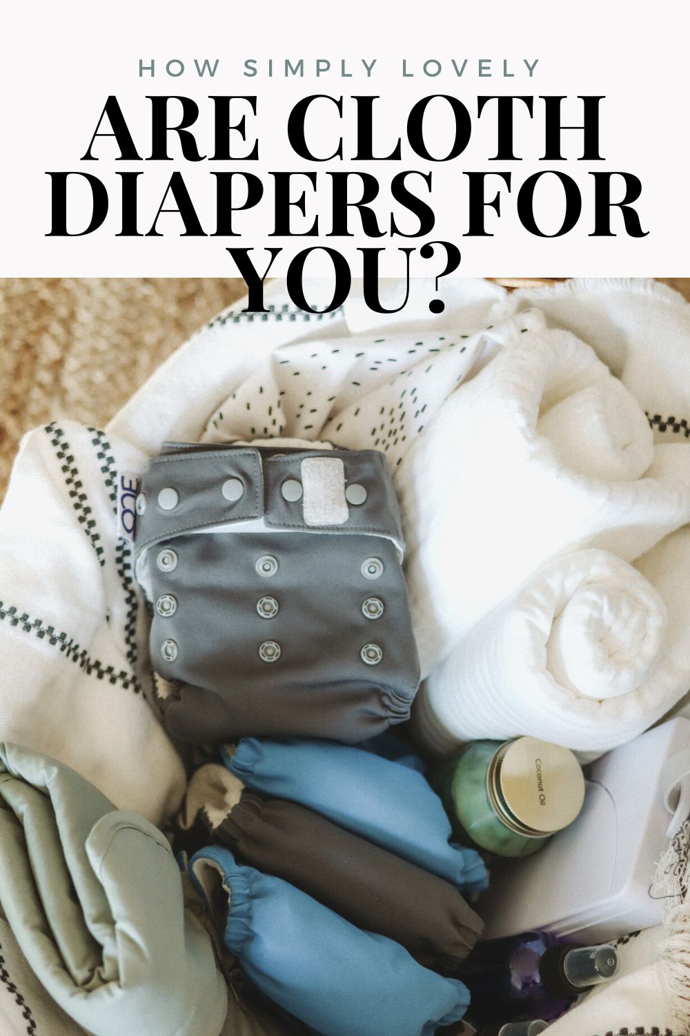 Baby changing basket with cloth diapers, portable changing pad, muslin blankets, baby wipe case, and wet bag. Writing that says: are cloth diapers for you?